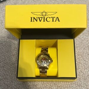 Invicta Gold Timepiece with Iconic Character
